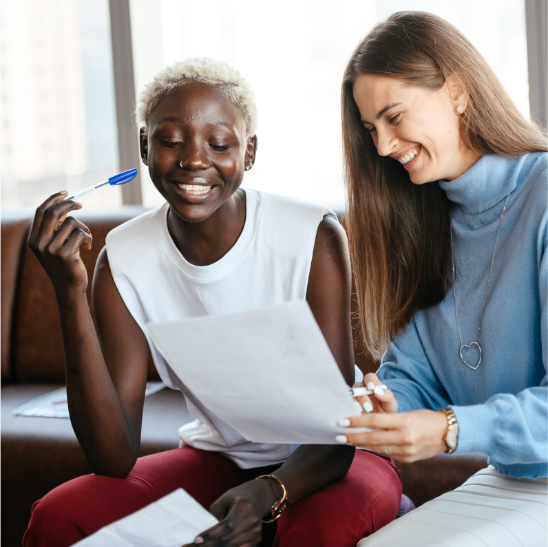 Two Women Reviewing Work